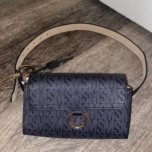 Steven Madden clutch with belt attachment. NWT